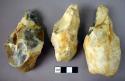 3 medium-sized, flint hand axes made on roughly pointed nodules