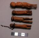 4 wooden figurines of witch doctors, 3" long