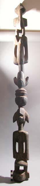 Chief's wand with carved multiple figures in wood