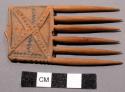 Comb, carved wood, punctate geometric design, rectangular handle w/ point
