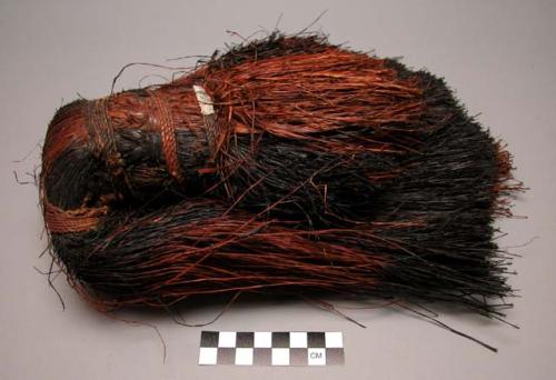 Woman's red and black raffia bustle - only piece of clothing ever worn by women