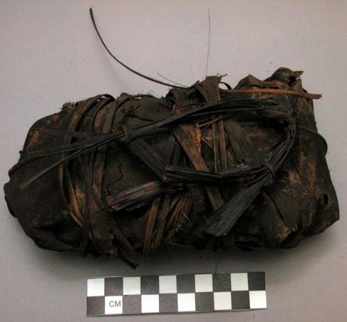 Large bundle of medicine wrapped in leaves