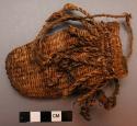 String bag, closely woven from dark brown fibre, mcuti