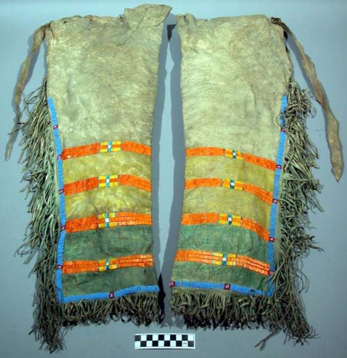 Pair of Arapaho chaps. 4 bands of quillwork, beadwork, fringe, and pigments