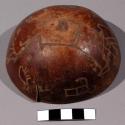 Gourd dish with crude incised design of human figure (1/2 of gourd)