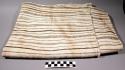 Hand loomed cloth banded design, vivid brown on white