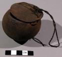 Small gourd container with lid attached - used to hold blowpipe poison+