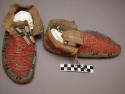 Pair of Sioux moccasins. Hard soles, one made from a parfleche. Leather uppers