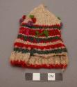 Miniature knitted baby's cap - used in fiesta of sta. barbara