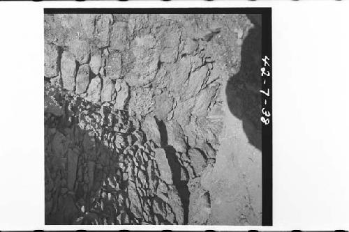 Acropolis. N. temple.  Center room, NE corner after excavation.  Lower wall, vau