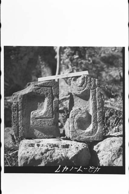 Carved facade stones re-used in colonial church complex