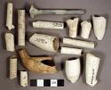 Kaolin, pipe stem, bowl, and heel fragments, some fragments have makers marks and are rouletted