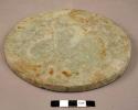 2 stone discs- smooth surface; probably used together for grinding meal