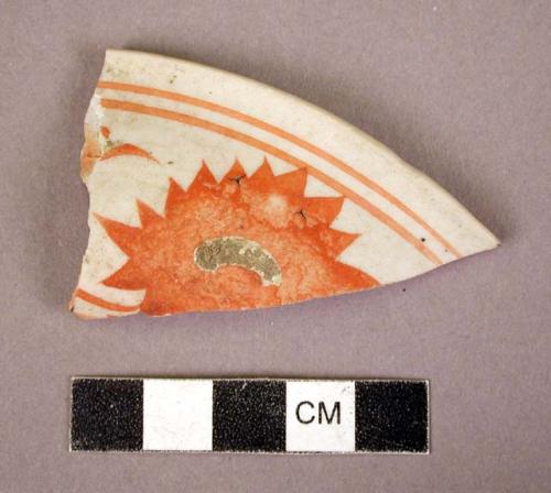 Rim potsherd of red and white porcelain