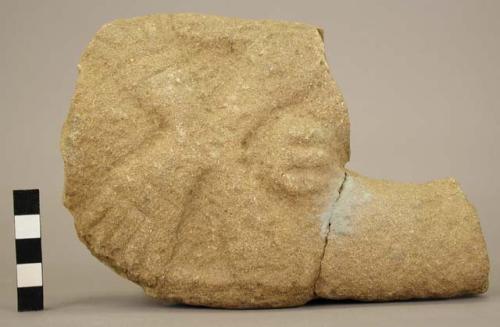 Fragment of stone figurine