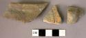 Scattered potsherds