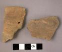 2 fragments of a pottery storage jar