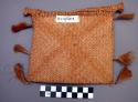 Man's small hand bag of buriti frond straw