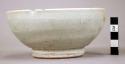 Celadon bowl with foot ring - glaze damage in one place