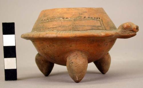 Guinea turtle effigy tripod bowl