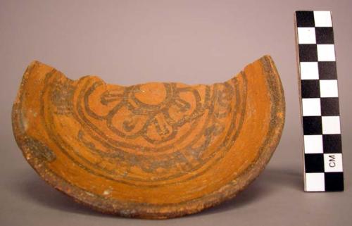 Ceramic dish, partial, brown on orange biomorphic & linear designs interior