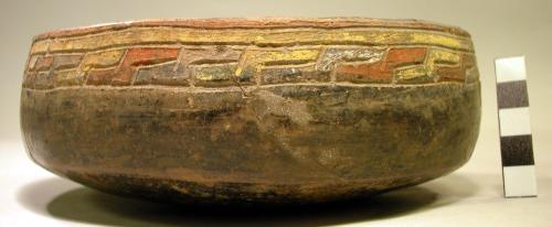 Restored incurving pottery bowl