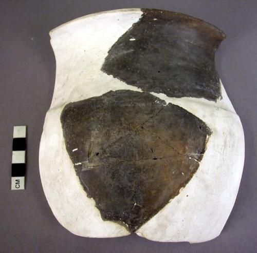 Ceramic jar sherd, round body, flared rim, reconstructed