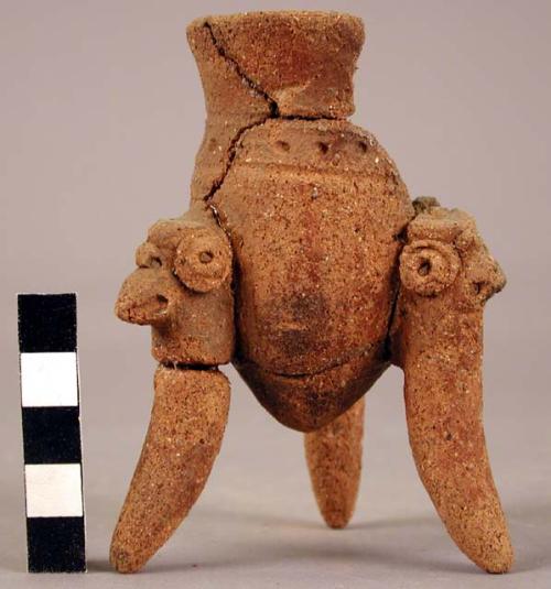 Small fragmentary tripod pottery vessel - restored