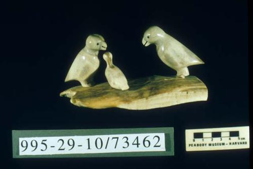 Antler carving of three puffins mounted on base