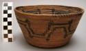 Basket: coiled, geometric design with double black lined pattern on brown