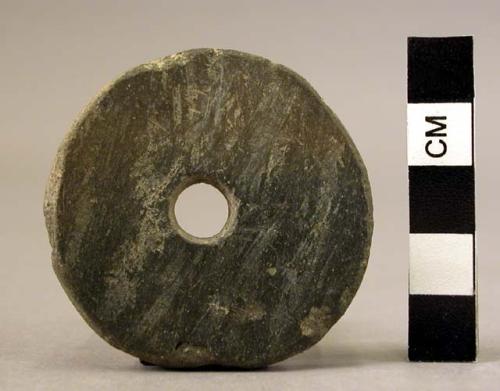 Spindle whorl made from a potsherd