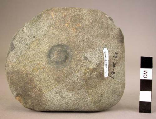 Ground stone fragment of palette, 1 side smooth, other broken, rounded corner