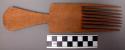 Carved combs, bought in local market, considered luxury item.  Indigenous to oth