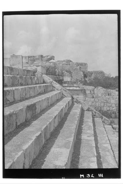 Monjas - from steps of Caracol with serpent head in foreground