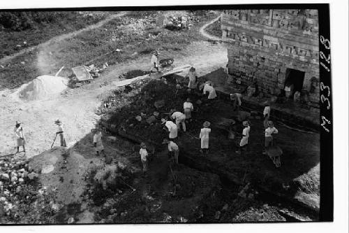 Cleaning in front of Iglesia at Monjas.