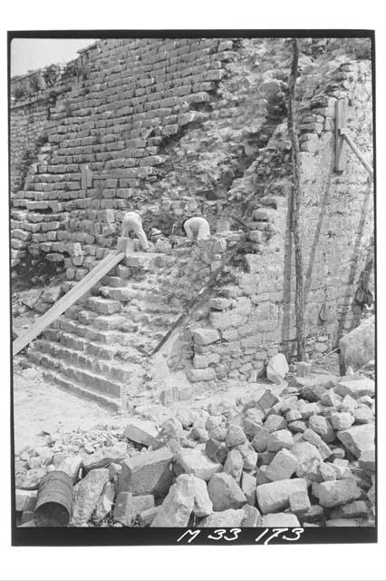 Preparing to set first rail at the Main Stairs of Monjas during reconstruction