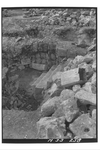 Stairs with metate at the northwest corner of the Northeast Platform at Monjas.