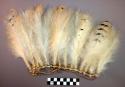 White feather object (skirt?)