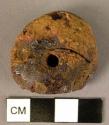 Disk-shaped amber pendant