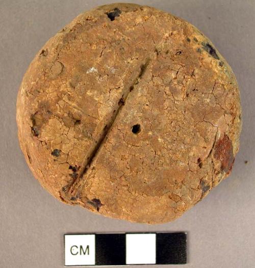 Very large disk-shaped amber pendant