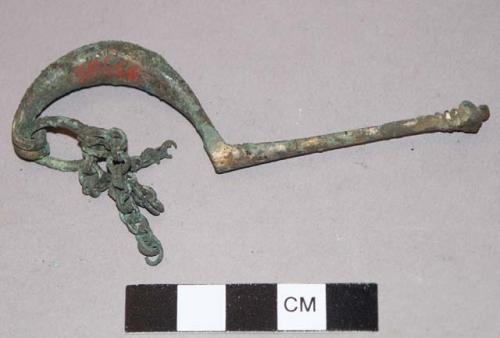 Fibula with chain attached