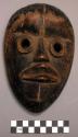 Small wooden face mask