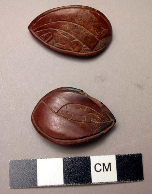 Gambling dice, carved, man holding elephant's tusk